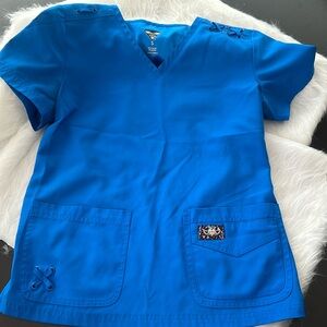 Koi Tech scrubs blue shirt